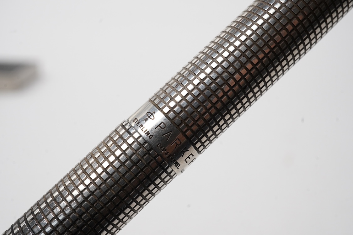 A Parker Sterling silver Cisele fountain pen and matching ballpen in original box along with a collector's pen case